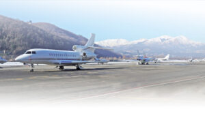 bg home plane mountains 1 300x176