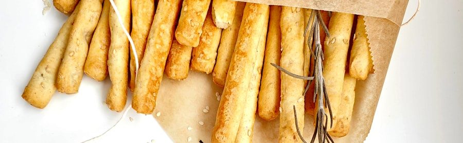 a bunch of french fries sitting on top of a cutting board